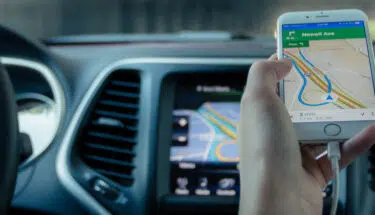 GPS tracker on a white smartphone screen
