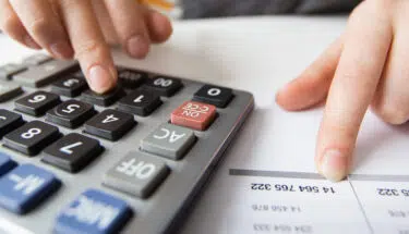 closeup accountant hands calculator
